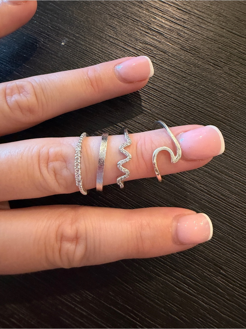 Bundle of four solid 925 silver bands